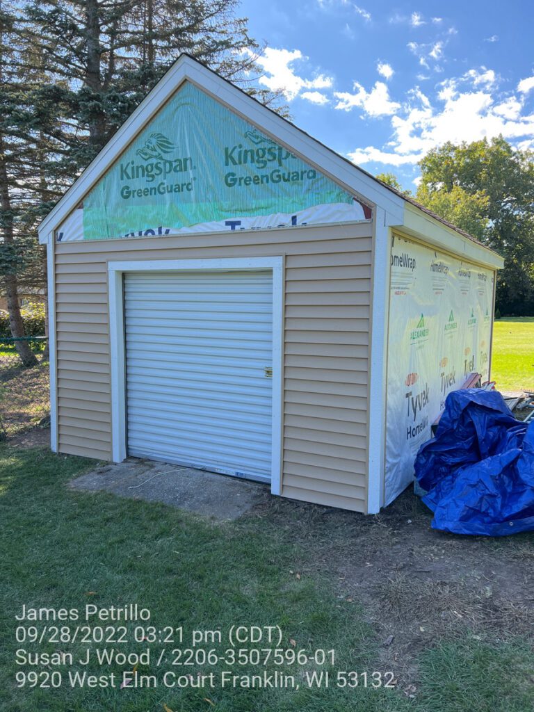 shed transformation in franklin wi featuring new siding and roof repair